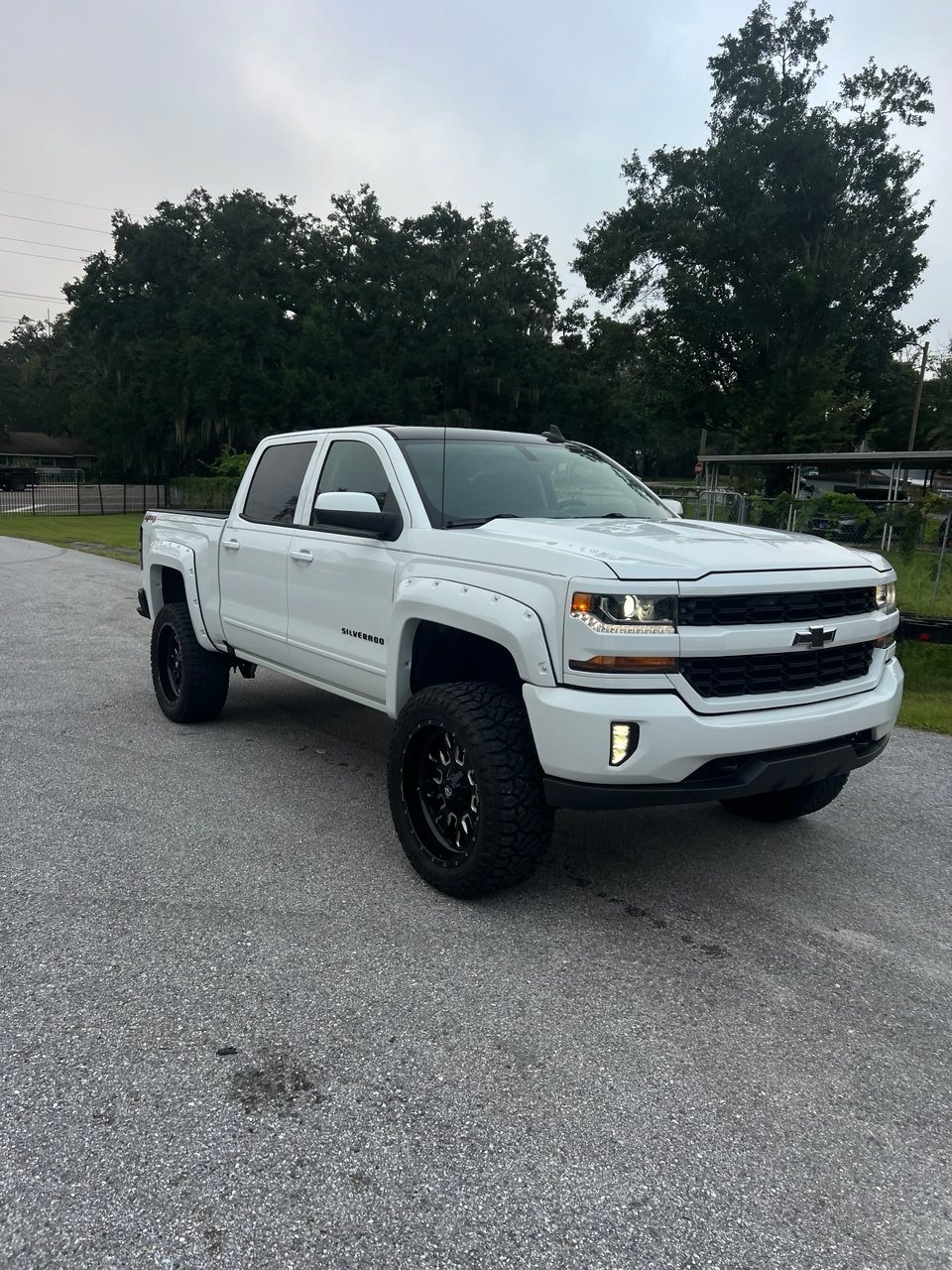 White pickup truck after body repair and refinishing at AFQ Auto Sales and Paint