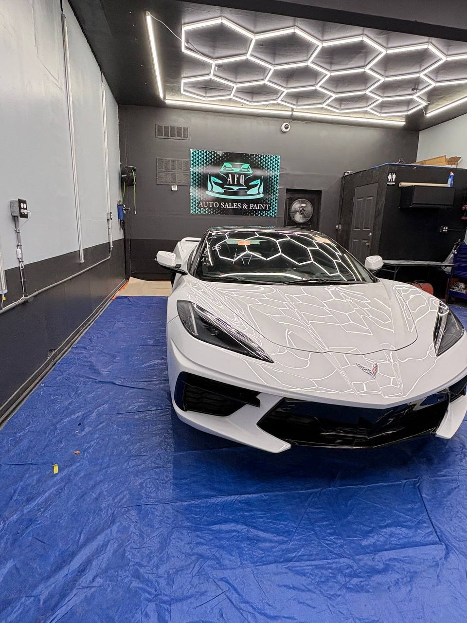 White Corvette after professional paint and finish work at AFQ Auto Sales and Paint